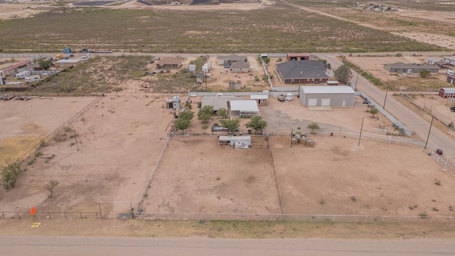 birds eye view of property featuring a rural view