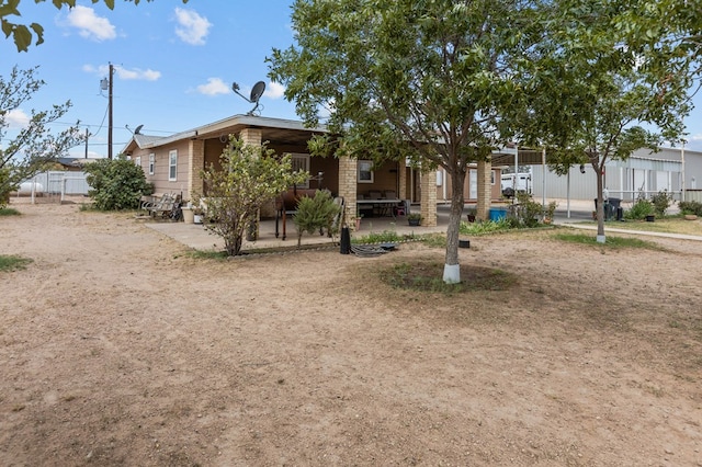 view of front of house featuring a patio