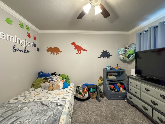 bedroom featuring a textured ceiling, ceiling fan, ornamental molding, and carpet flooring