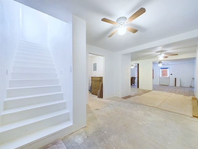 unfurnished room with ceiling fan