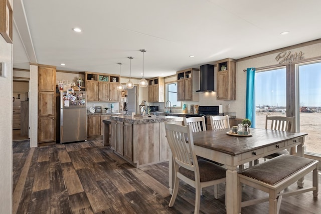 dining space with dark wood-style flooring and recessed lighting