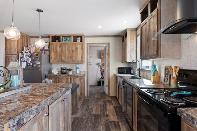 kitchen featuring black / electric stove, open shelves, a sink, freestanding refrigerator, and wall chimney exhaust hood