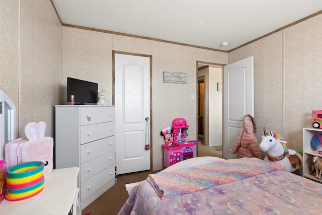 bedroom featuring carpet flooring and crown molding