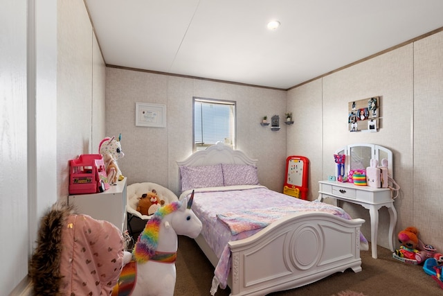 bedroom with ornamental molding and carpet flooring