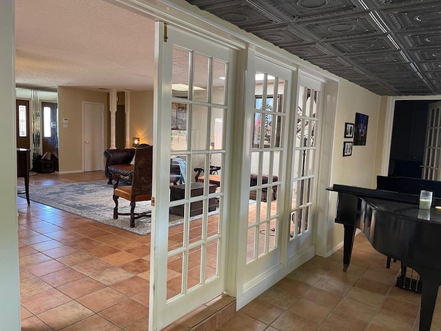 entryway featuring light tile patterned flooring