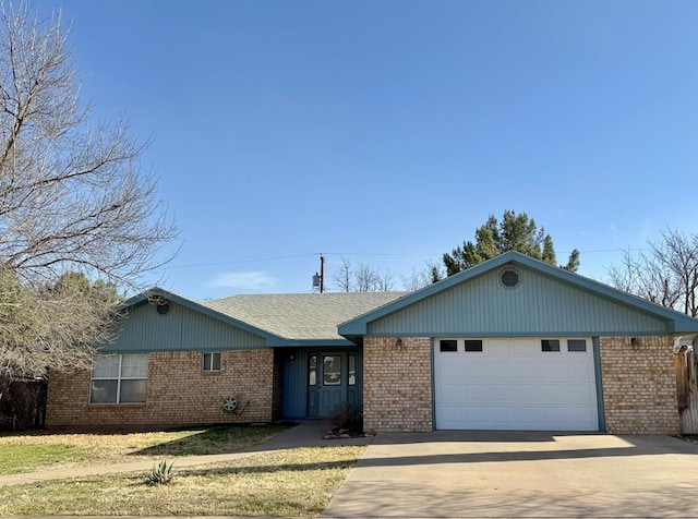 ranch-style home featuring driveway, a garage, and brick siding