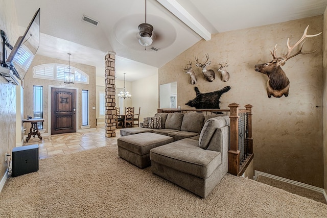 living room with vaulted ceiling with beams and ceiling fan with notable chandelier