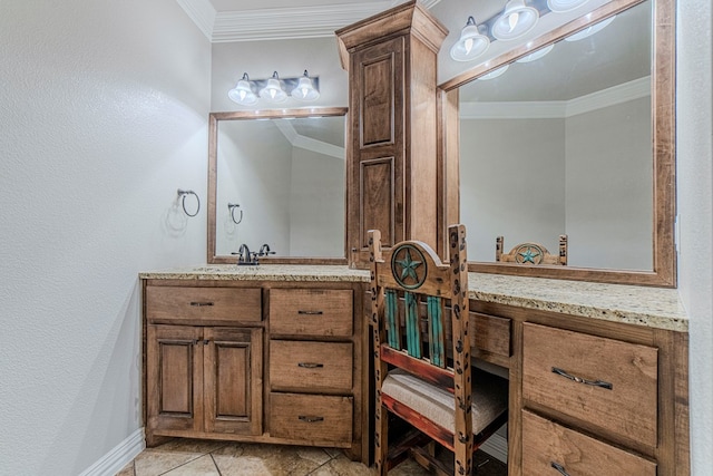 bathroom with tile patterned flooring, vanity, and crown molding