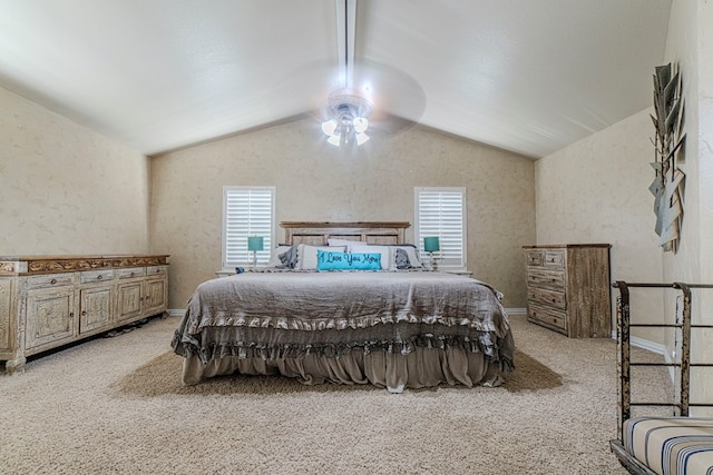 bedroom featuring light colored carpet and lofted ceiling