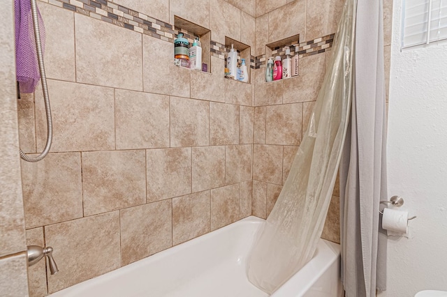 full bath featuring shower / bath combination with curtain