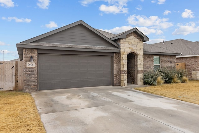 single story home featuring a garage