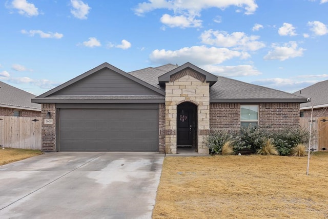 single story home featuring a garage