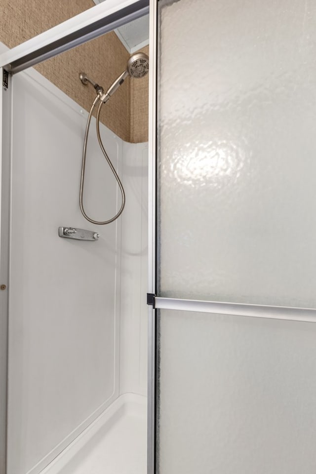 bathroom featuring a stall shower