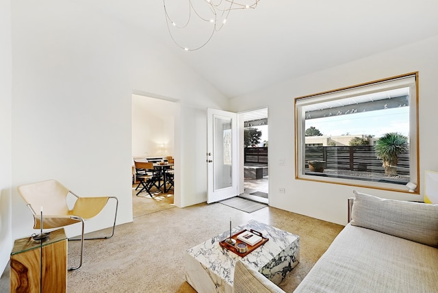 living room featuring light colored carpet and high vaulted ceiling