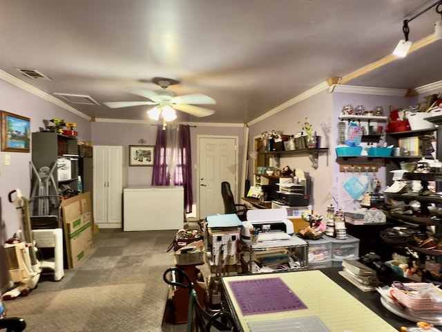 interior space with visible vents, track lighting, crown molding, carpet, and ceiling fan