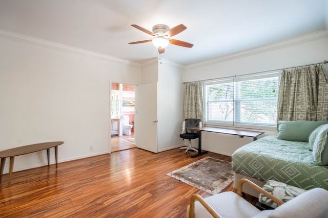 living room with hardwood / wood-style flooring, crown molding, and ceiling fan