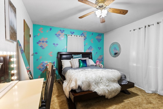 carpeted bedroom featuring a ceiling fan