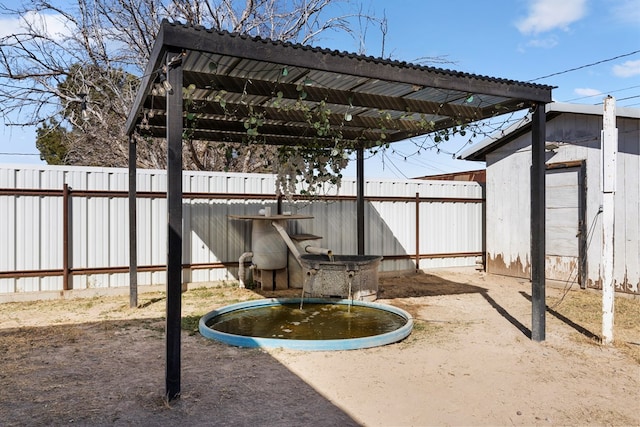 exterior space featuring a fenced backyard