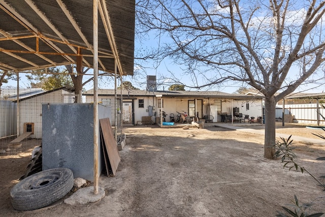 exterior space featuring fence