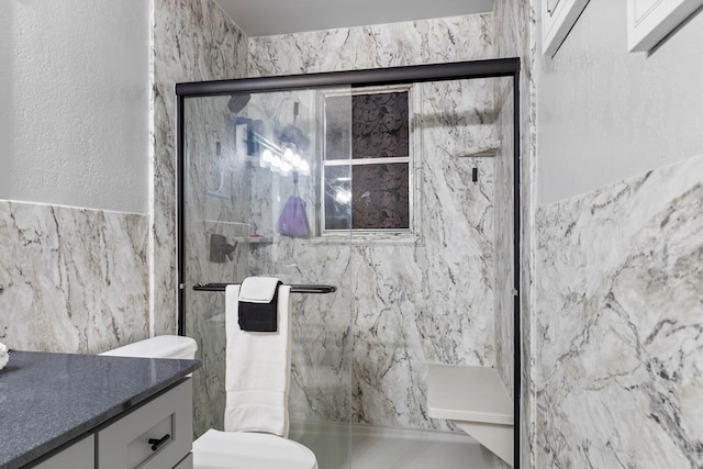 full bathroom featuring a textured wall, toilet, vanity, tile walls, and an enclosed shower