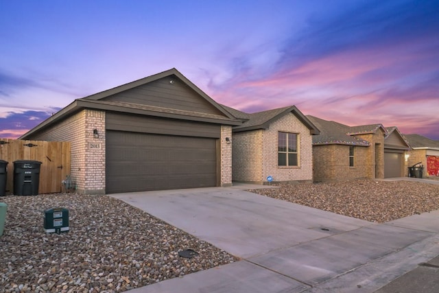 single story home with a garage