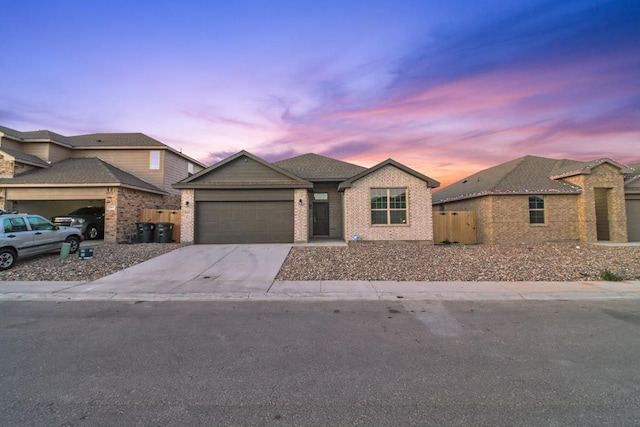 view of front of property featuring a garage