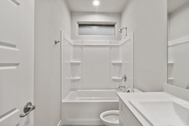 full bathroom with vanity,  shower combination, and toilet