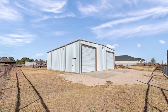 view of outdoor structure featuring a garage