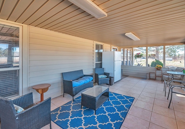 sunroom / solarium with wooden ceiling