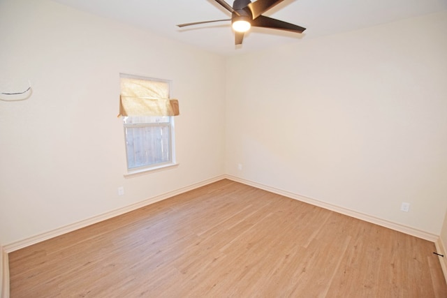 spare room featuring hardwood / wood-style flooring