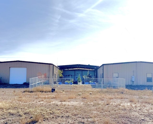 view of outdoor structure with a garage