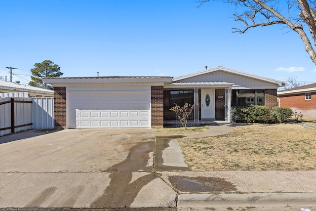 ranch-style home featuring a garage