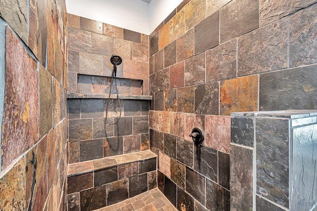 details with a tile shower