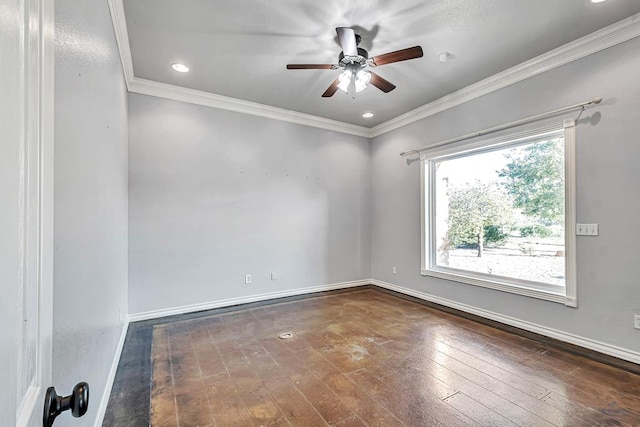 unfurnished room with dark wood-style floors, ceiling fan, ornamental molding, and baseboards