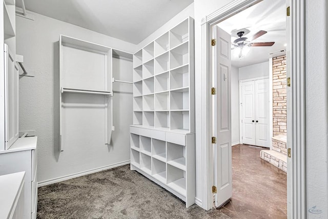 spacious closet featuring ceiling fan