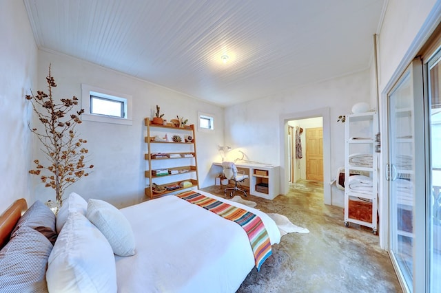 bedroom featuring concrete floors