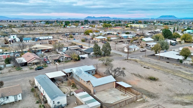 aerial view at dusk with a mountain view