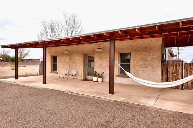 rear view of house featuring a patio area