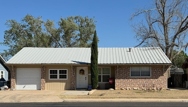 single story home with a garage