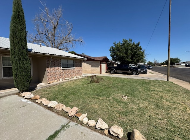 view of home's exterior with a lawn