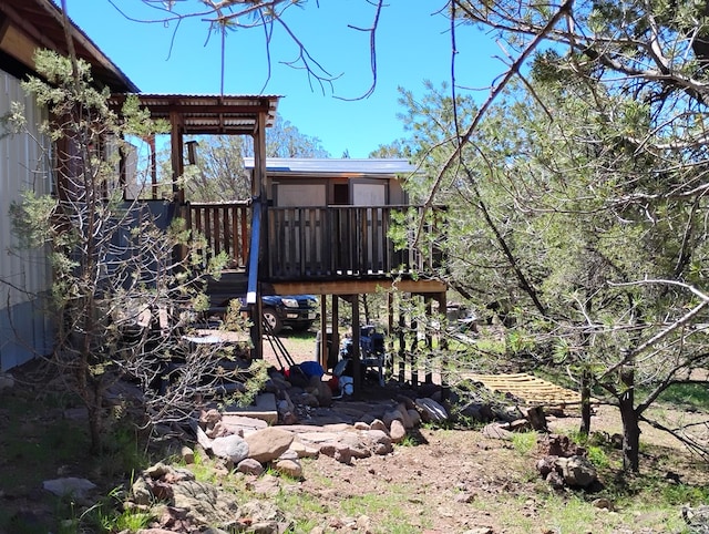 view of yard with a wooden deck