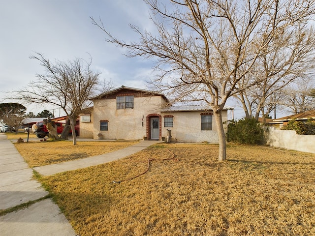 view of front of house with a front yard