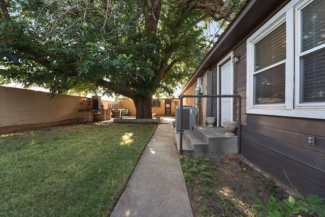 view of yard featuring central AC