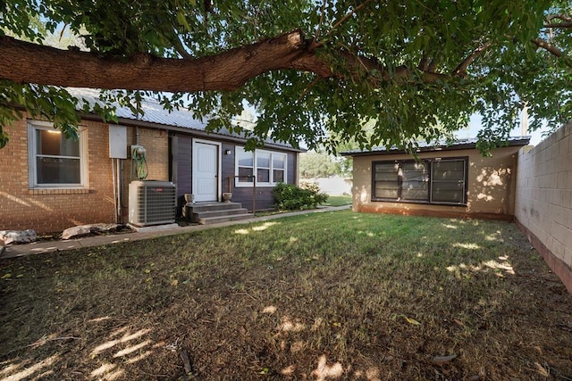 view of yard featuring central AC