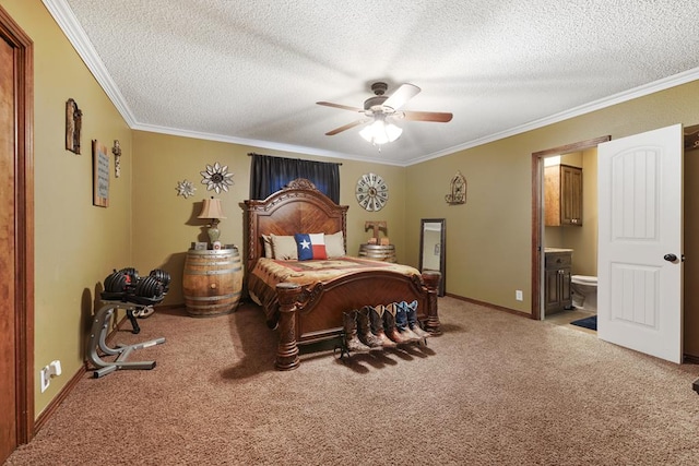 bedroom with ceiling fan, ensuite bathroom, carpet floors, and a textured ceiling