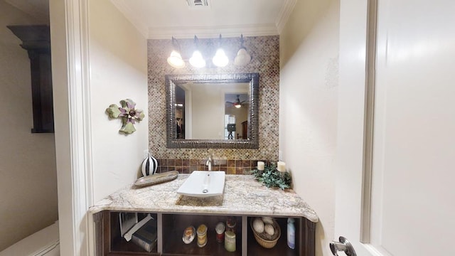 bathroom with vanity and crown molding