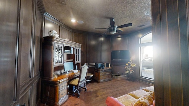 office space with ceiling fan, dark hardwood / wood-style flooring, and a textured ceiling