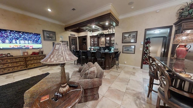 recreation room with light tile patterned flooring and ornamental molding