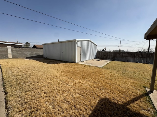 view of outbuilding with an outbuilding and a fenced backyard