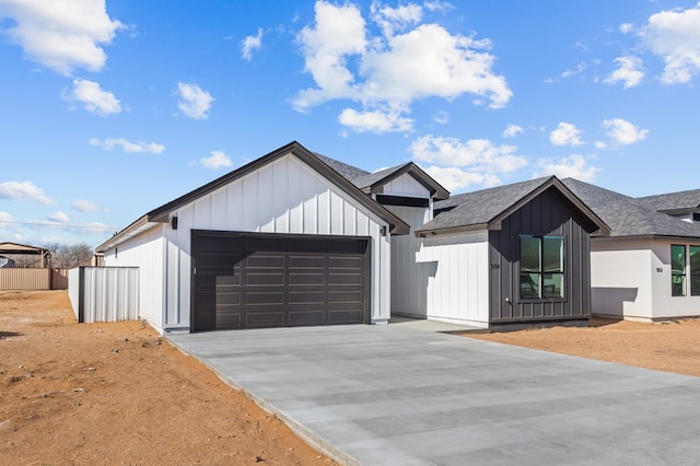 modern farmhouse style home featuring a garage